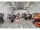 Spacious garage with metal walls, concrete floors, and plenty of space for storage at 4908 Main St., Loris, SC 29569