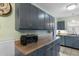 Kitchen featuring gray cabinets, updated countertops, and great storage at 4908 Main St., Loris, SC 29569