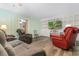 Cozy living room with comfortable seating, TV, and built in shelving at 4908 Main St., Loris, SC 29569