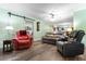 Spacious living room featuring modern furnishings and a neutral color palette at 4908 Main St., Loris, SC 29569