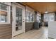 Cozy sun room with tiled floors, natural light, and work space at 4908 Main St., Loris, SC 29569