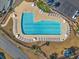Overhead view of the pool area featuring ample seating and a meticulously maintained landscape at 4929 Pond Shoals Ct. # 201, Myrtle Beach, SC 29579