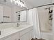 Bathroom featuring a tub, shower, and sleek fixtures at 4929 Pond Shoals Ct. # 201, Myrtle Beach, SC 29579