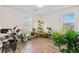 Bright bonus room featuring wood floors and multiple windows at 4929 Pond Shoals Ct. # 201, Myrtle Beach, SC 29579