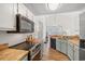 Kitchen featuring modern appliances, butcher block countertops and ample storage at 4929 Pond Shoals Ct. # 201, Myrtle Beach, SC 29579