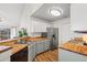 Well-equipped kitchen with butcher block countertops and stainless steel appliances at 4929 Pond Shoals Ct. # 201, Myrtle Beach, SC 29579