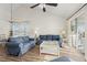 Bright living room with vaulted ceilings, hardwood floors, and ample natural light at 4929 Pond Shoals Ct. # 201, Myrtle Beach, SC 29579