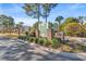 Welcoming Windsor Green community sign beautifully landscaped at the entrance at 4929 Pond Shoals Ct. # 201, Myrtle Beach, SC 29579