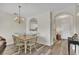 Cozy dining area with seating for six, located just off of the kitchen and main entry at 5801 Oyster Catcher Dr. # 822, North Myrtle Beach, SC 29582