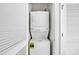 Convenient in-unit stacked washer and dryer in a closet with louvered doors at 5801 Oyster Catcher Dr. # 822, North Myrtle Beach, SC 29582