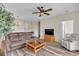 Spacious living room featuring hardwood floors, a ceiling fan, and an open doorway at 5801 Oyster Catcher Dr. # 822, North Myrtle Beach, SC 29582
