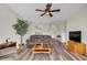 Inviting living room features hardwood floors, ceiling fan and comfortable seating at 5801 Oyster Catcher Dr. # 822, North Myrtle Beach, SC 29582