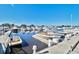 Picturesque marina view featuring numerous boats docked on a sunny day at 5801 Oyster Catcher Dr. # 822, North Myrtle Beach, SC 29582