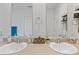 This bathroom has double sinks, mirrors and updated fixtures at 519 Grass Fern Ct., Longs, SC 29568