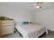 Bright bedroom with a ceiling fan, and lots of natural light from a large window at 519 Grass Fern Ct., Longs, SC 29568