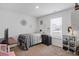 Cozy bedroom features neutral carpet, blinds and wall decor at 519 Grass Fern Ct., Longs, SC 29568