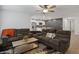 The open-concept design seamlessly connects the living room to the modern kitchen at 519 Grass Fern Ct., Longs, SC 29568