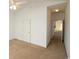 Bedroom featuring neutral walls, vaulted ceiling, and doorway to hallway at 528 Banks Dr. # 2-4 & 2-4G, Myrtle Beach, SC 29588