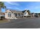 Well-maintained single-story home with covered porch and manicured landscaping at 528 Banks Dr. # 2-4 & 2-4G, Myrtle Beach, SC 29588