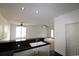 Open kitchen with breakfast bar overlooking a bright living space at 528 Banks Dr. # 2-4 & 2-4G, Myrtle Beach, SC 29588