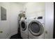Bright laundry room featuring modern washer and dryer appliances and a water heater at 528 Banks Dr. # 2-4 & 2-4G, Myrtle Beach, SC 29588