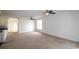 Open-concept living room is spacious with neutral walls and ceiling fans at 528 Banks Dr. # 2-4 & 2-4G, Myrtle Beach, SC 29588