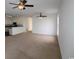 Spacious living room open to kitchen, featuring ceiling fans and ample natural light at 528 Banks Dr. # 2-4 & 2-4G, Myrtle Beach, SC 29588