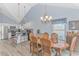 Dining room featuring a chandelier, wood table and chairs, with hardwood floors at 6001-1086 S Kings Hwy., Myrtle Beach, SC 29575