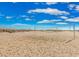Scenic beach volleyball net with a clear sky background, perfect for outdoor sports and recreation at 6001-1086 S Kings Hwy., Myrtle Beach, SC 29575