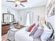 Cozy bedroom offers wood-look floors, neutral walls and a bright window at 662 Sunnyside Dr. # 101, Murrells Inlet, SC 29576