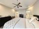 Spacious primary bedroom boasts tray ceilings, ensuite bath access and neutral walls at 662 Sunnyside Dr. # 101, Murrells Inlet, SC 29576