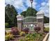 Landscaped entrance sign to Longwood Plantation-Blackmoor with colorful plants and a golf ball detail at 662 Sunnyside Dr. # 101, Murrells Inlet, SC 29576