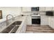Beautiful kitchen featuring granite counters, stainless steel appliances, and a large sink, perfect for cooking at 662 Sunnyside Dr. # 101, Murrells Inlet, SC 29576