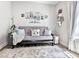 Comfortable living room offers neutral walls and plenty of natural light at 662 Sunnyside Dr. # 101, Murrells Inlet, SC 29576