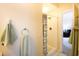 Bright bathroom features a walk-in shower and neutral tones with convenient towel racks, providing a clean and functional space at 670 Riverwalk Dr. # 304, Myrtle Beach, SC 29579