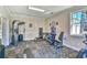 Bright fitness center offering modern weight machines, and carpeted floor at 670 Riverwalk Dr. # 304, Myrtle Beach, SC 29579