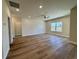 Spacious living room with recessed lighting, shiplap accent wall, luxury vinyl plank flooring, and an open layout at 713 9Th Ave. S, North Myrtle Beach, SC 29582