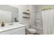 Clean bathroom showcasing vanity, floating shelves, and a tub-shower combination at 743 Plumage Ct., Myrtle Beach, SC 29588