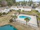 Aerial view of the pool and lake at 8538 Hopkins Circle # E, Surfside Beach, SC 29575