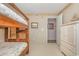 Comfortable bedroom features bunk beds and neutral decor at 8538 Hopkins Circle # E, Surfside Beach, SC 29575