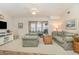 Open living room offering comfortable seating and neutral colored walls at 8538 Hopkins Circle # E, Surfside Beach, SC 29575