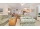 Open concept living area flowing into a dining area and bright kitchen at 8538 Hopkins Circle # E, Surfside Beach, SC 29575