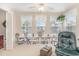 Bright office space featuring built-in shelves, desk, and natural light at 8538 Hopkins Circle # E, Surfside Beach, SC 29575