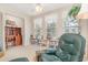 Bright office space featuring built-in shelves, desk, and natural light at 8538 Hopkins Circle # E, Surfside Beach, SC 29575