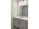 Bathroom featuring a vanity with light gray cabinets, a stylish countertop, and a large mirror at 8639 Farrier Dr., Myrtle Beach, SC 29588