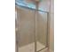 Modern bathroom shower with glass doors and light tiled walls at 8639 Farrier Dr., Myrtle Beach, SC 29588