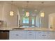 Open-concept kitchen with an island that overlooks the living area, perfect for entertaining at 8643 Farrier Dr., Myrtle Beach, SC 29588