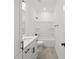 Clean bathroom with white vanity, bathtub and shower combo at 885 Bear Lake Dr., Longs, SC 29568