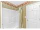 Bathroom with shower and decorated with unique wallpaper at 914 Hillside Dr. S # O, North Myrtle Beach, SC 29582