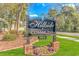 Hillside Commons community sign with greenery and manicured landscaping at 914 Hillside Dr. S # O, North Myrtle Beach, SC 29582